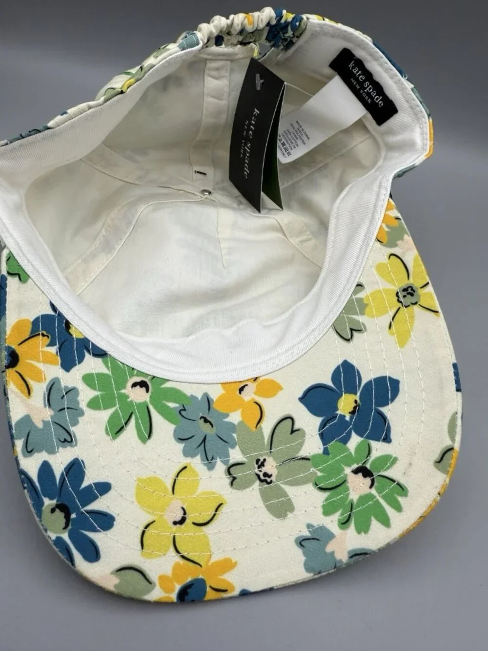 NWT Kate Spade Floral Printed Cap Hat Cream Yellow Blue Green Spade Logo